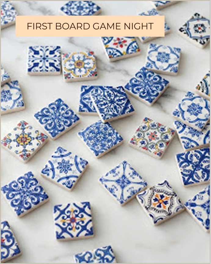 Scattered colorful patterned square tiles inspired by Portuguese azulejos from the Azul board game